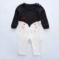 Baby knitted cotton jumpsuit with long sleeves and concealed buttons in neutral colour for autumn winter