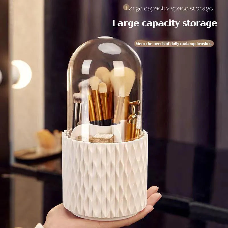 White acrylic rotating makeup brush holder with transparent dust cover on desktop