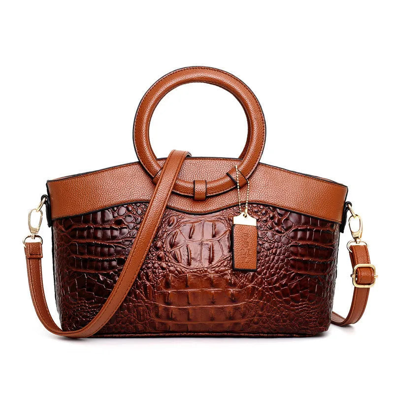Fabric ladies casual handbag showing multiple compartments including zipper pocket and phone bag