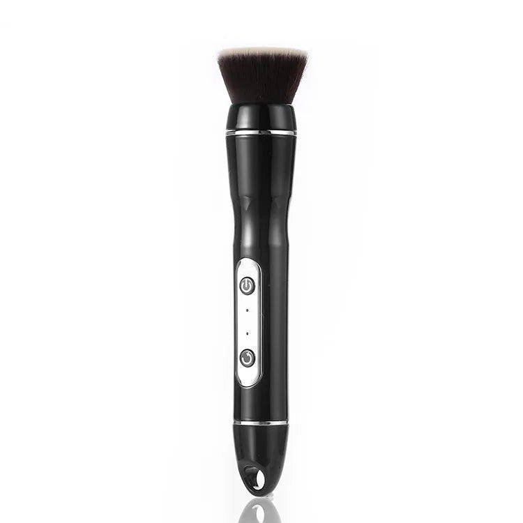 Electric makeup brush with white body, fibre wool bristles, and two rounded brush heads including foundation and blush applicators