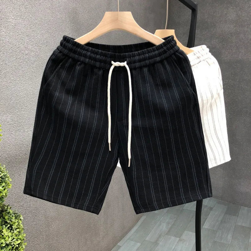 Men's black and white striped fleece-lined casual shorts with an elastic waistband