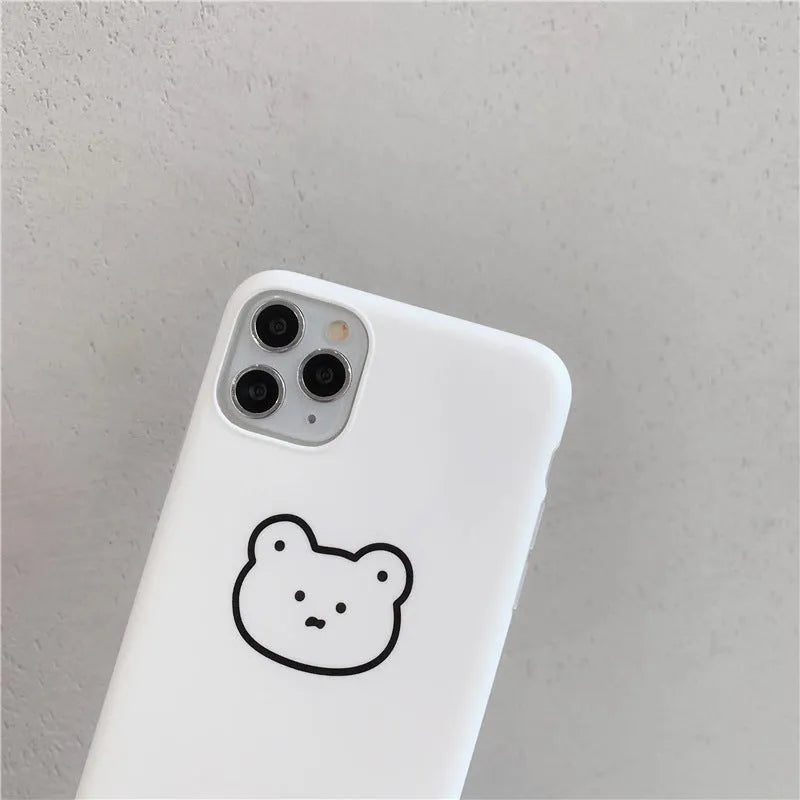 Soft silicone mobile phone case for iPhone with a cartoon Korean bear design on the back.