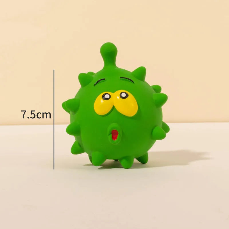 Set of four colourful latex squeaky dog balls with cute faces on bumpy textured surfaces