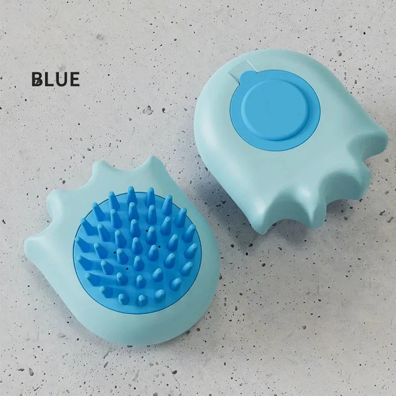 Blue pet bath brush with a shampoo reservoir and soft comb head for washing dogs or cats.