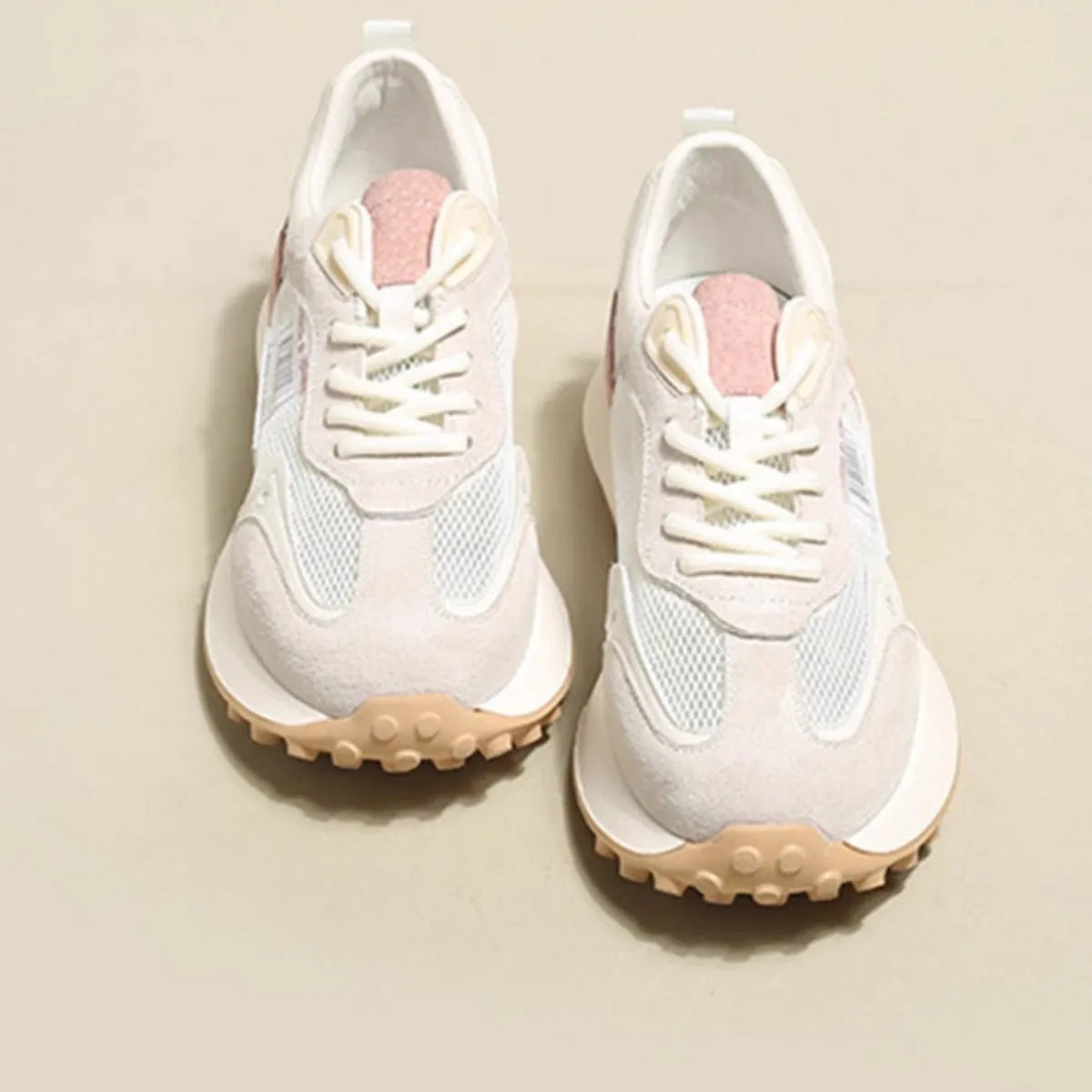 Women's grey and pink retro sneakers with mesh lining and rubber soles, low-top design