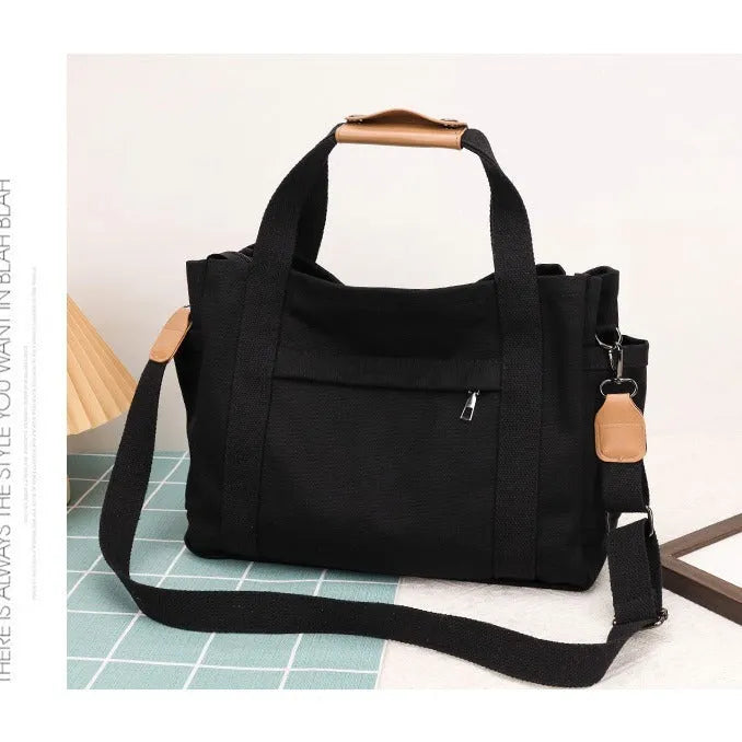 Large capacity canvas tote bag with internal organisers and side zippers in Army Green colour