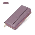 Genuine leather long bifold wallet for women in multiple solid colours showing bifold design.