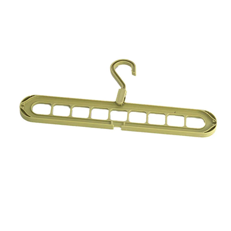 Green plastic nine-hole folding hanger for trousers displayed open and folded flat.