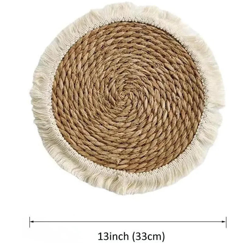 Japanese straw round placemat with tassel trim in natural papyrus material on dining table
