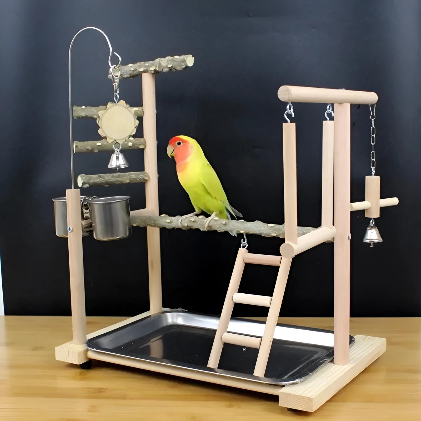 Natural pepper wood parrot play stand with multiple perches and an attached toy rack.