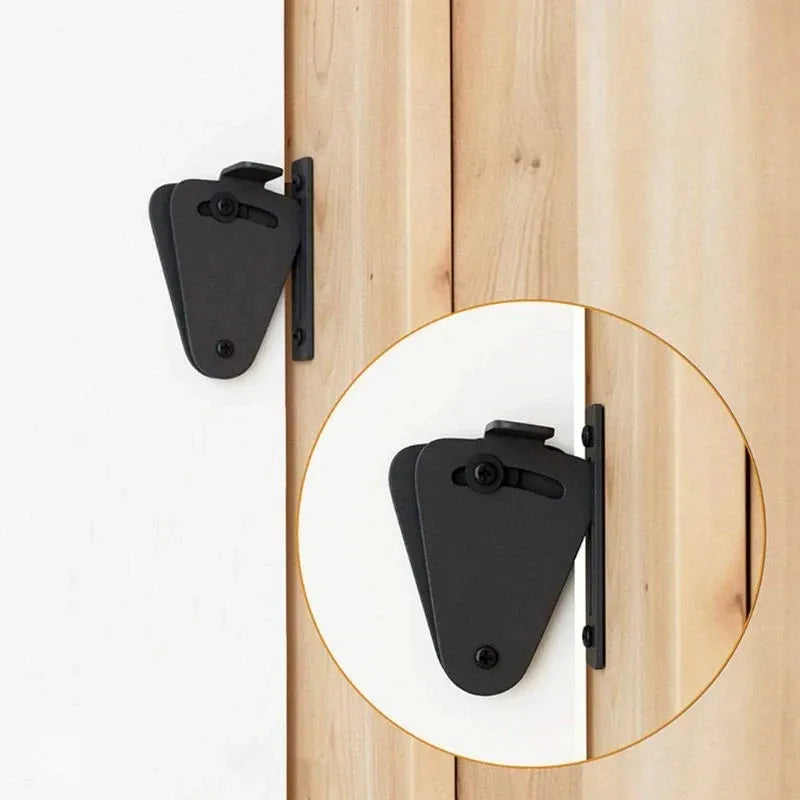 Black stainless steel sliding barn door lock for interior doors.