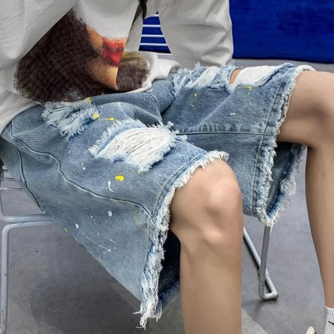 Men's loose fit water washed hole denim shorts in black and light blue colours