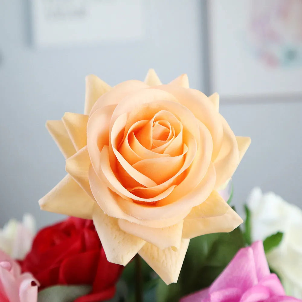 Artificial silk touch rose flower with red petals on a green plastic stem, showing approximate 42cm length.
