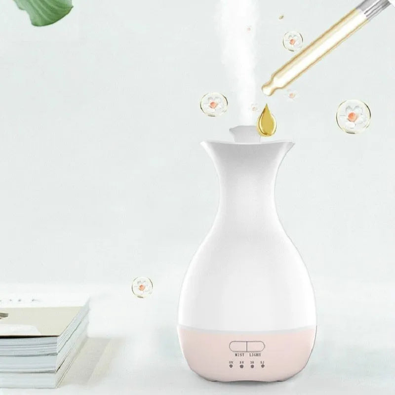 White ultrasonic aromatherapy vase humidifier with colourful LED night light and 200ml water tank capacity
