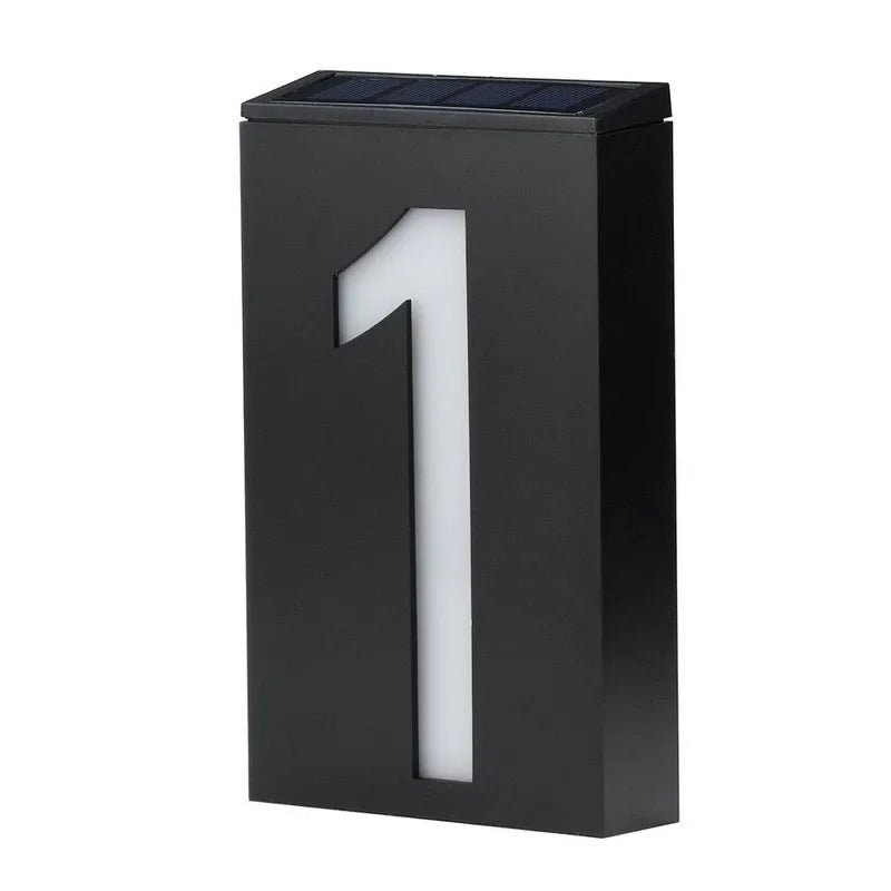 Solar powered outdoor house number light with LED illumination and concealed mounting design