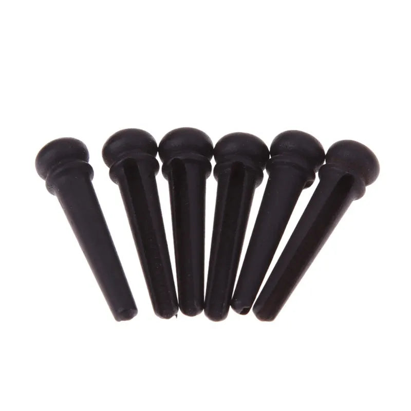 Six solid ebony guitar string pins with matt black finish for folk acoustic guitars