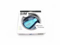 Blue coloured USB SIM card reader for mobile phone data transfer and backup.