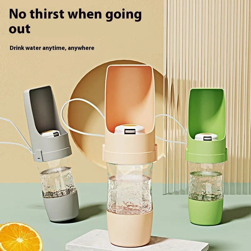 Grey 2-in-1 travel dog water bottle and feeder with lanyard, showing water and food compartments