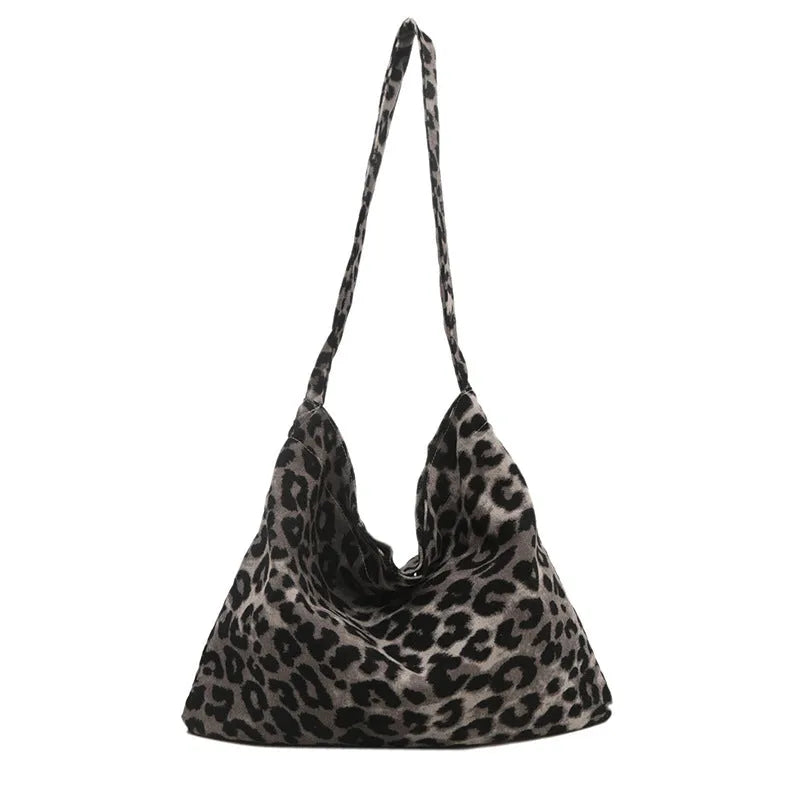 Leopard print shoulder messenger bag with square vertical shape and single strap, available in black, brown, and pink