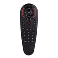 G30 wireless keyboard air mouse remote control with nano USB receiver on a table.