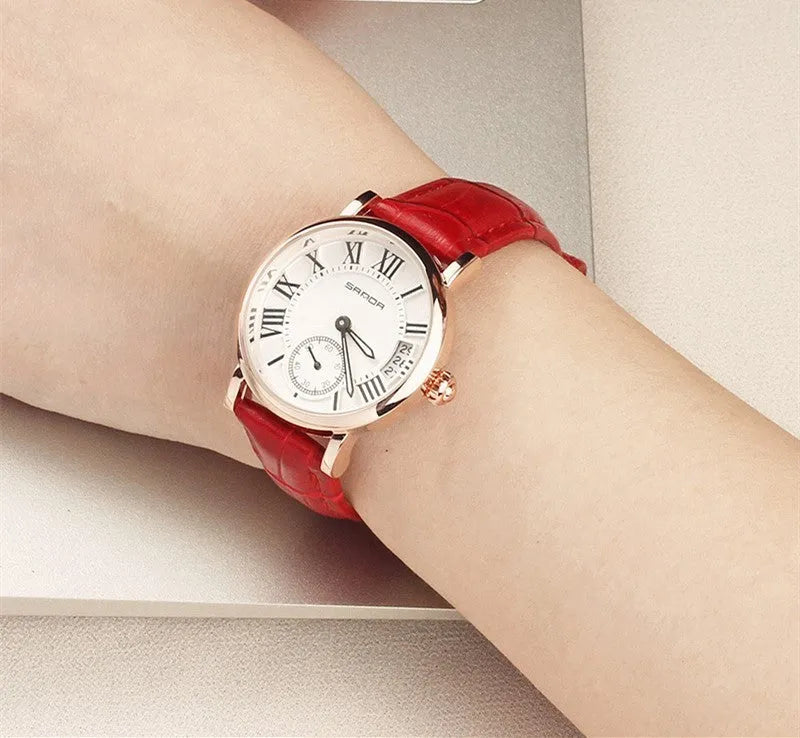 Women's waterproof quartz watch with round 32mm dial, leather strap, and onion crown