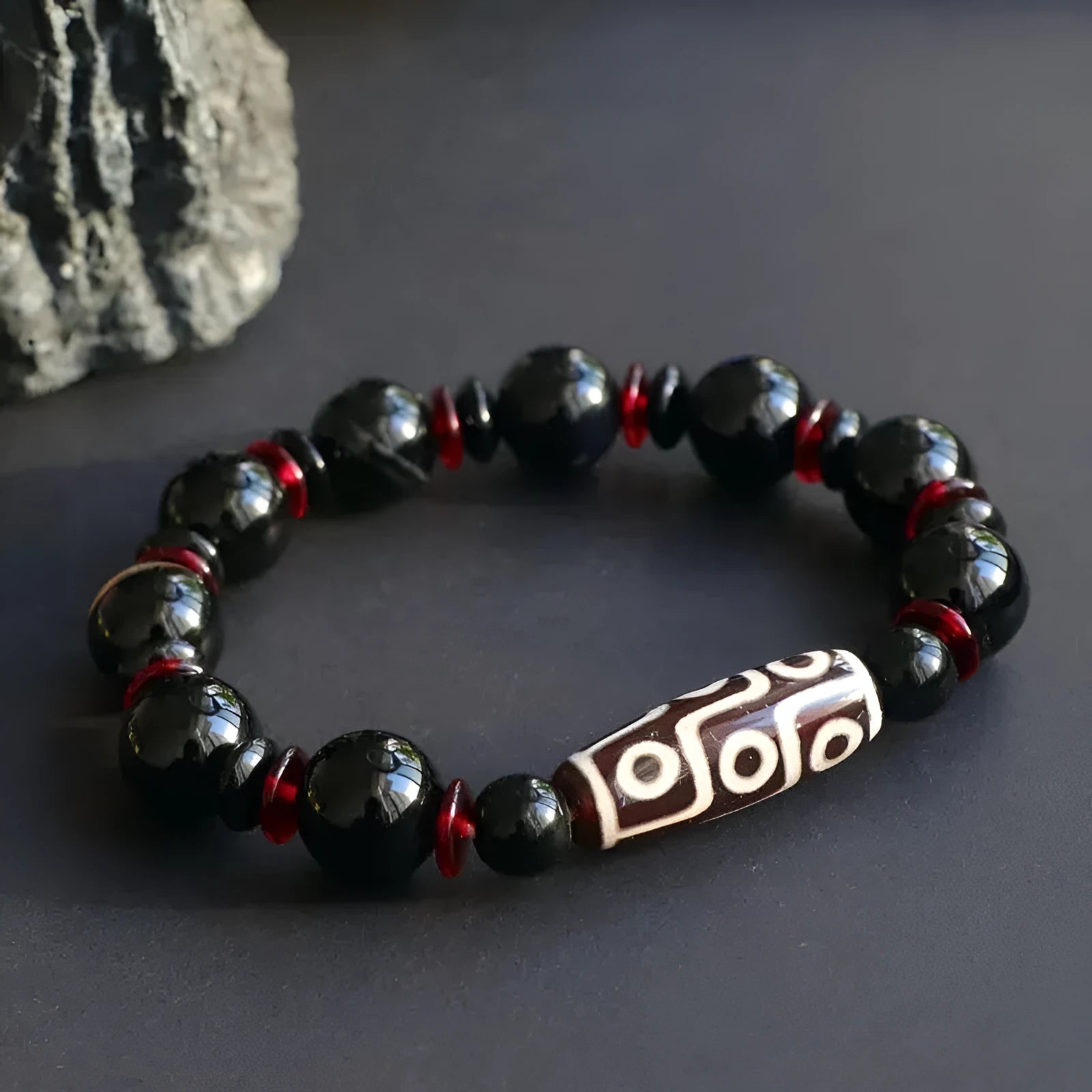 Black agate Dzi bead bracelet with hand-woven geometric pattern in national style design
