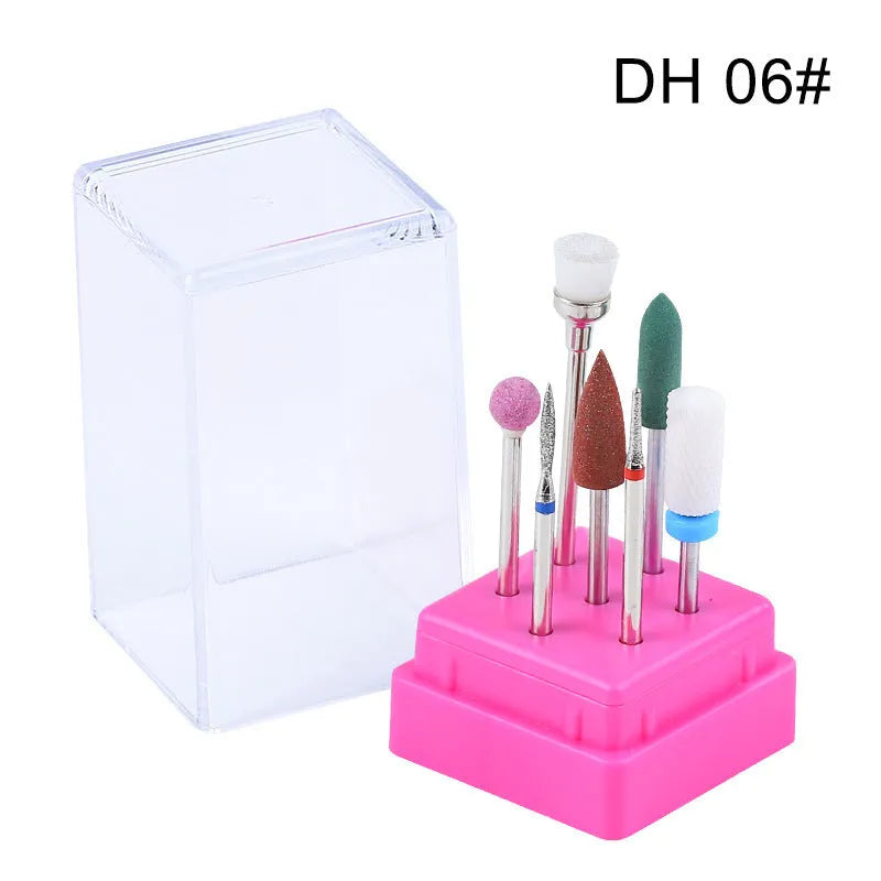 Tungsten steel nail drill polishing head set with 7 bits and a brush in a transparent case.