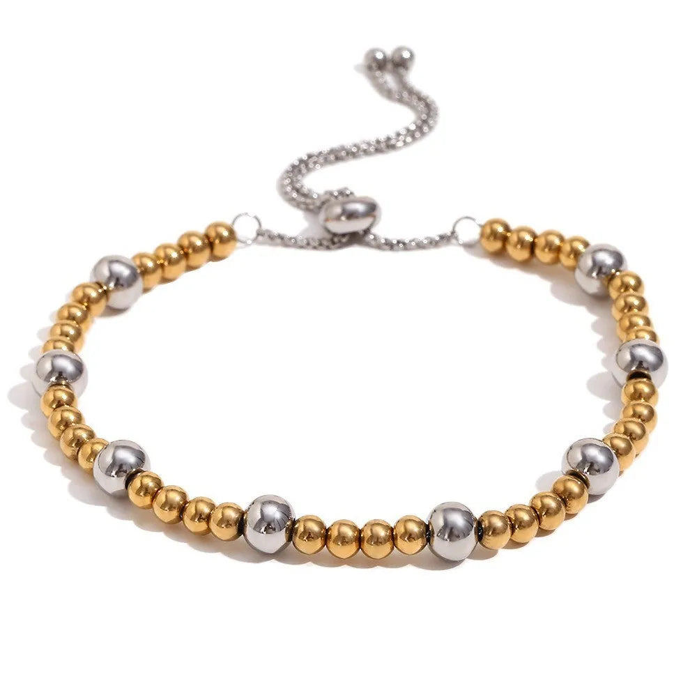 Gold geometric circle design jewellery set with earrings, necklace and bracelet