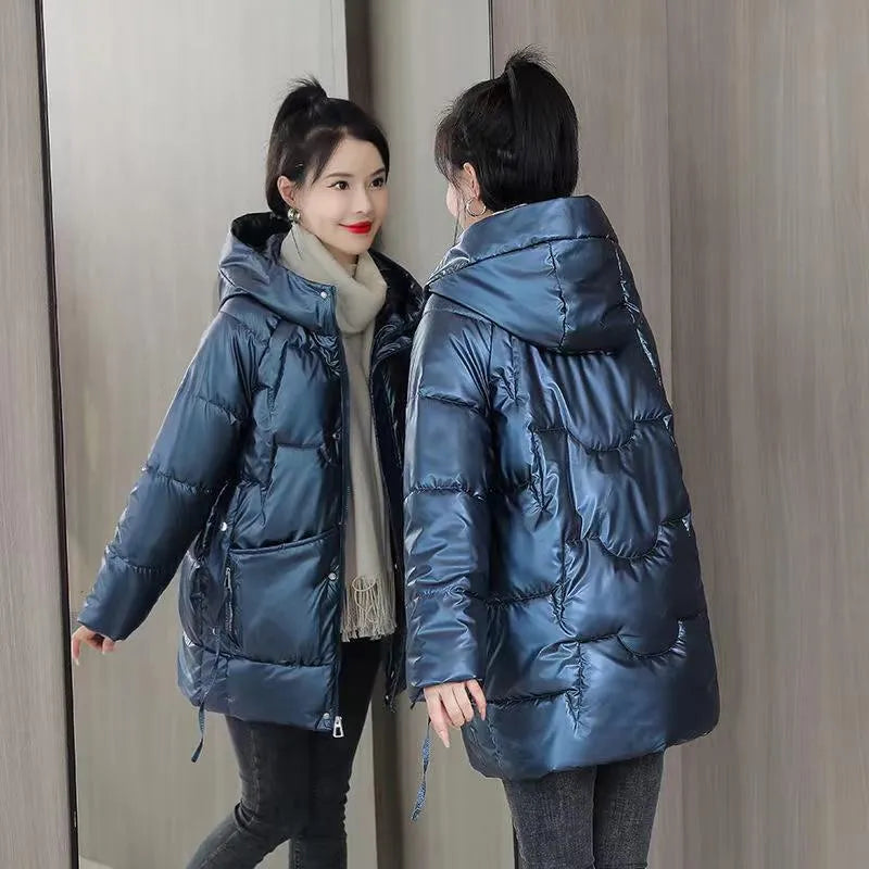 Women's loose thick winter hooded jacket in black colour with long sleeves