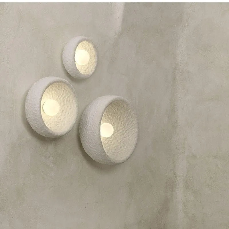 Japanese-style minimalist resin wall lamp in warm light, showing size options.