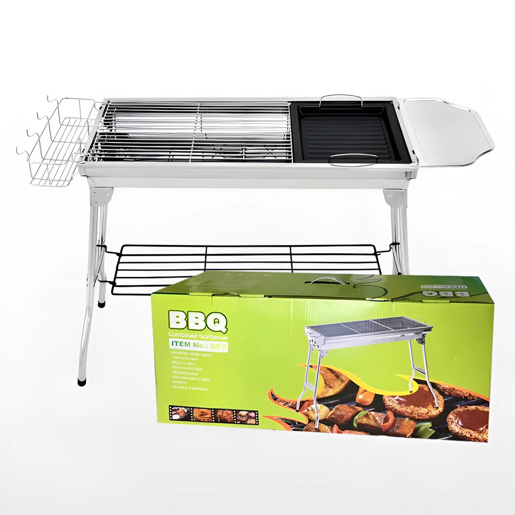 Stainless steel portable folding barbecue oven with grills, shown outdoors.