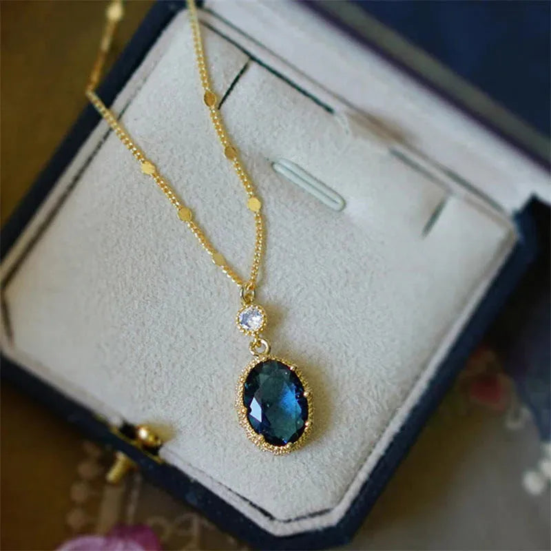Gold geometric pendant necklace with French retro styling on copper chain