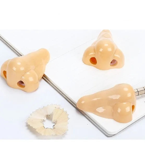 Flesh colour geometry-shaped plastic pencil sharpener with big nostril opening for manual pencil sharpening