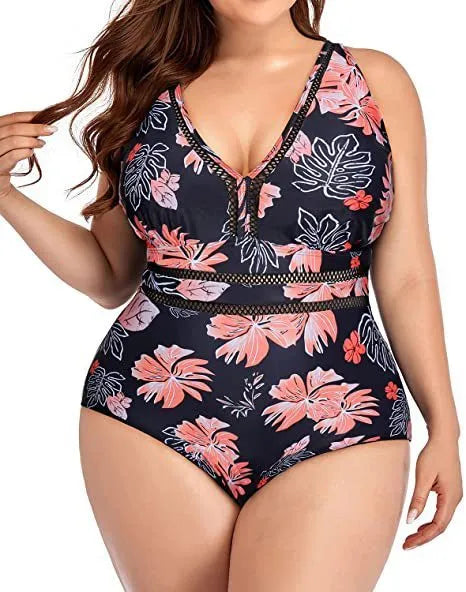 Women's plus size black print bikini swimsuit made from polyester mesh fabric.