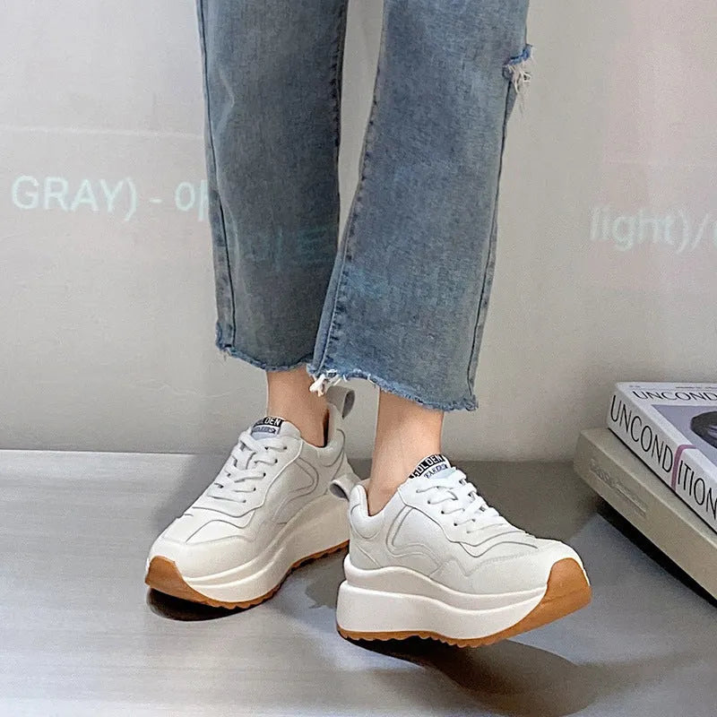 Women's beige cattlehide leather casual sports shoes with cross strap detail and mesh lining