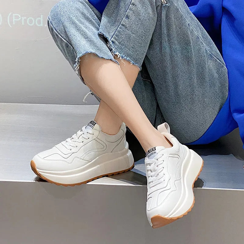 Women's beige cattlehide leather casual sports shoes with cross strap detail and mesh lining
