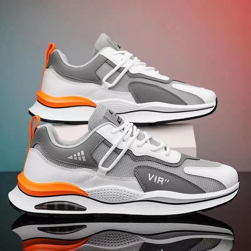 Men's grey breathable mesh running shoes with EVA sole and round toe design