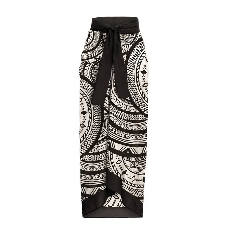 Women's vintage print one-piece swimsuit with deep V-neck, ruffles, and matching wrap skirt