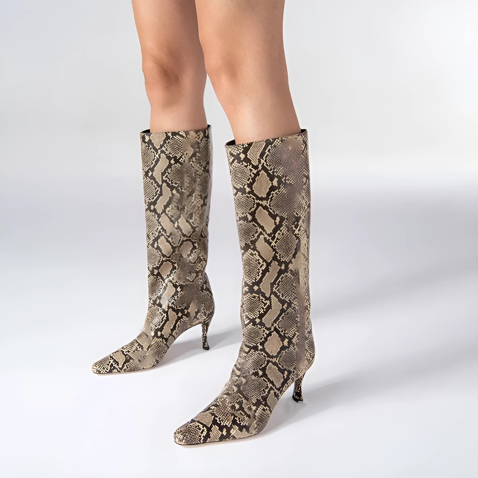 Women's square toe ankle cowboy boots in microfiber, shown in multiple colours including black, grey, and snake pattern.