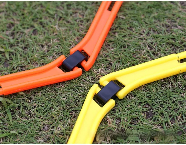 Six foldable hexagon agility training rings in green, orange, and yellow colours for football drills.