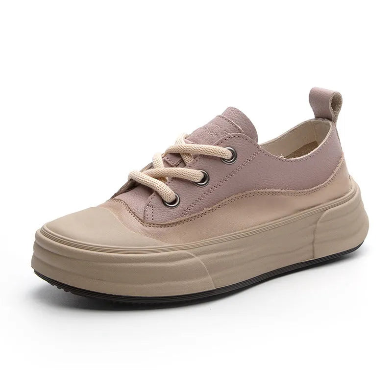 Women's leather platform sneakers in matcha green, side view showing round toe and lace-up design.