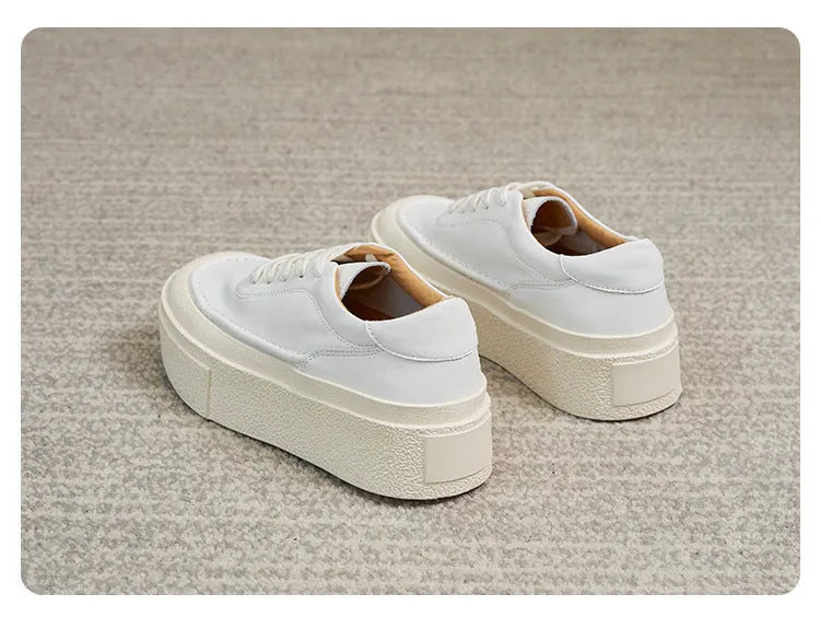 Women's black platform sports board shoes with embossed cowhide leather and rubber sole