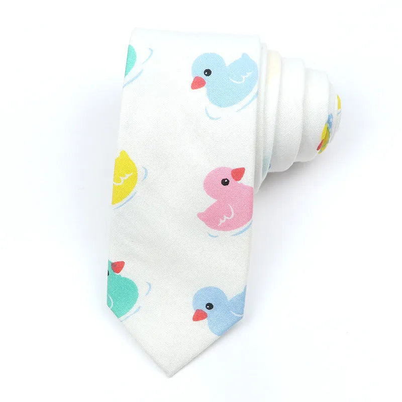 Narrow cotton bow tie with a printed cartoon pattern in a selection of colours.