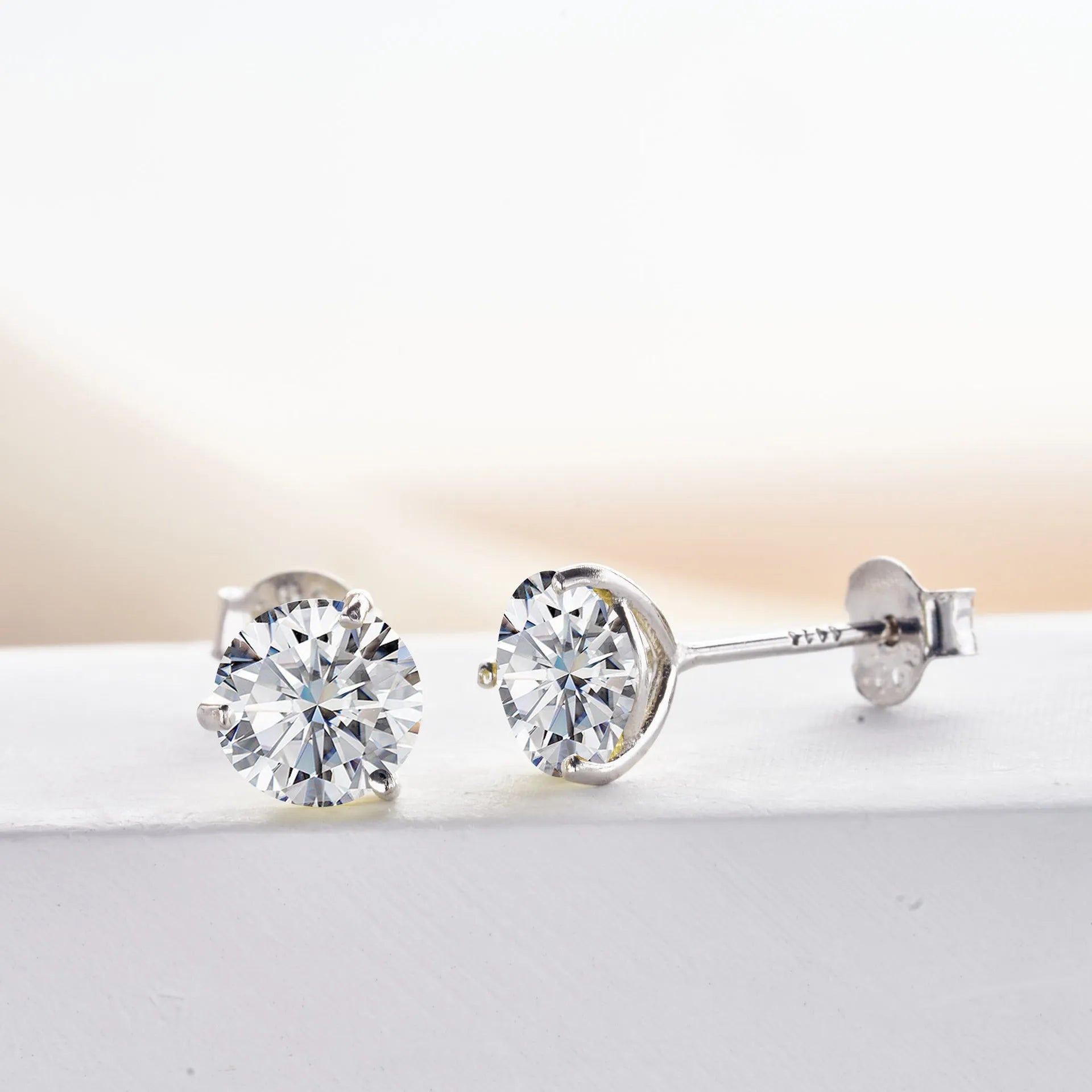Micro inlaid moissanite stud earrings in S925 sterling silver with round natural stones, unisex design, 1CT per pair