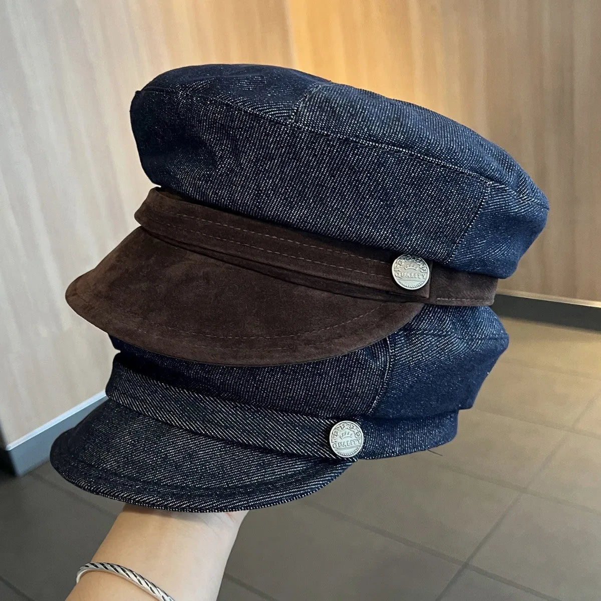 Dark blue denim octagonal newsboy hat with adjustable 54-58cm sizing and colour accent brim options
