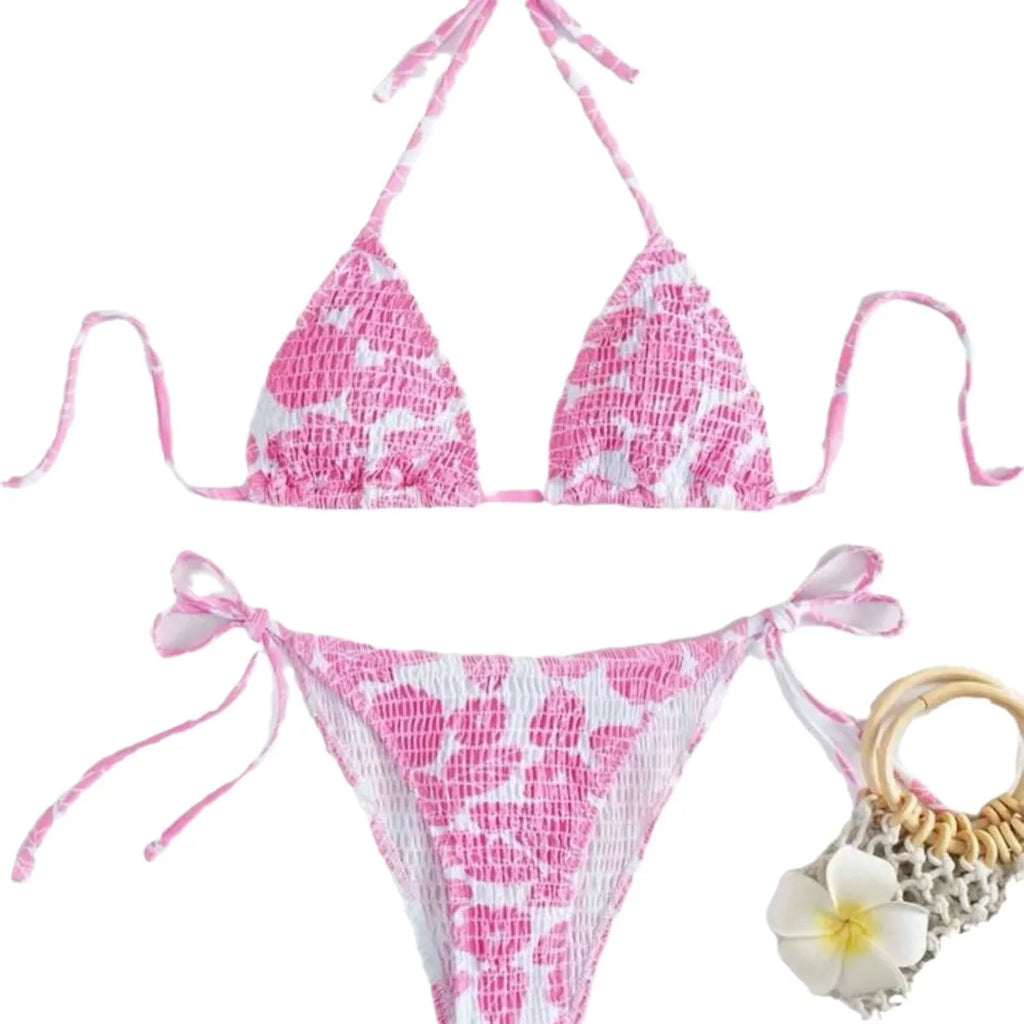 Women's floral patterned halter-neck bikini set in multiple colours on a mannequin