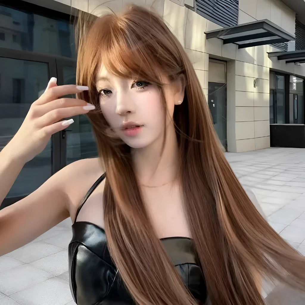 Warm brown long straight synthetic wig with a full fringe, shown on a model.