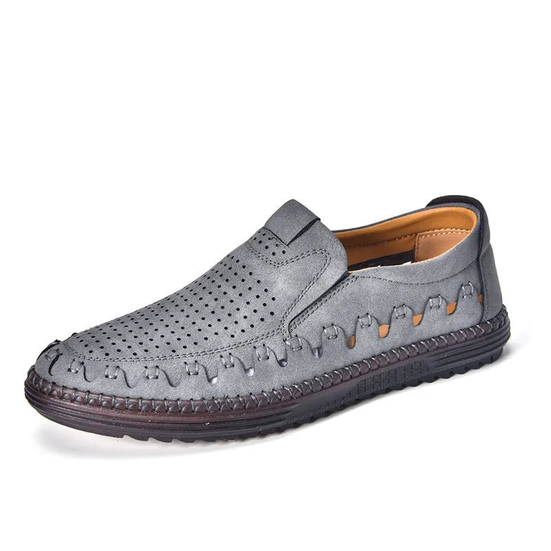 Men's brown slip-on casual leather shoes with round toe and flat heel on a white background.