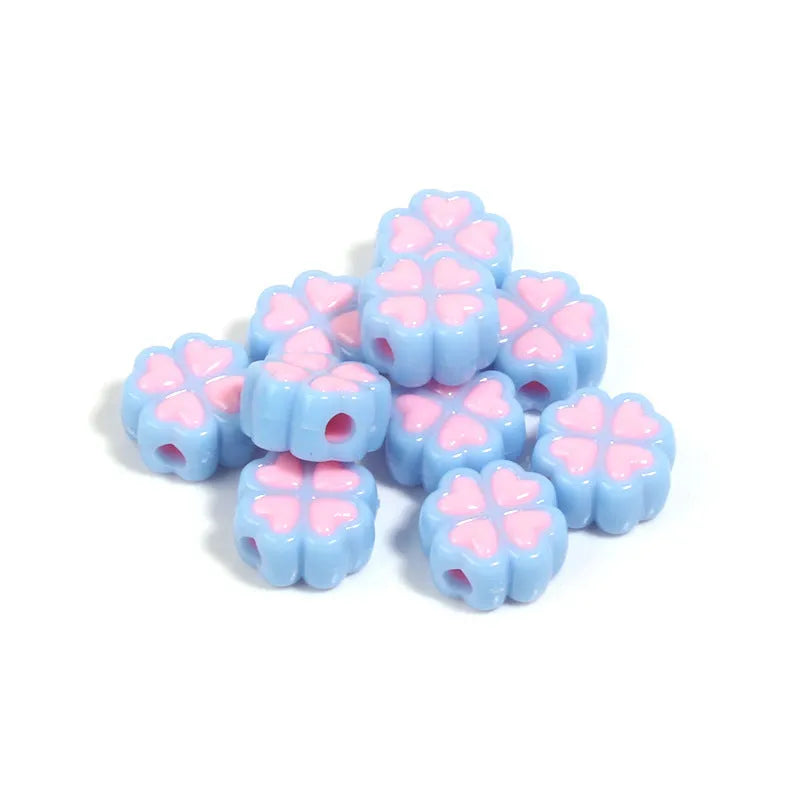 Assortment of 15mm frosted acrylic four-leaf clover beads in rose red, pink, yellow, green, blue, and purple colours.