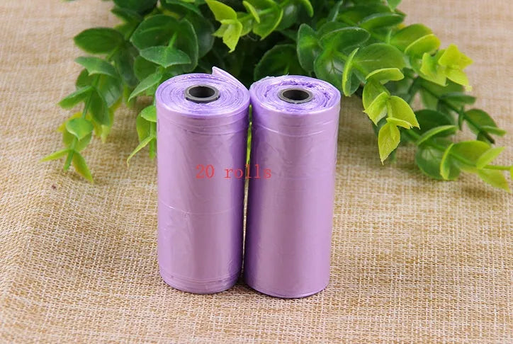 Bone-shaped pet garbage bag dispenser in new PP material, 8cm long and 5cm wide, on a table